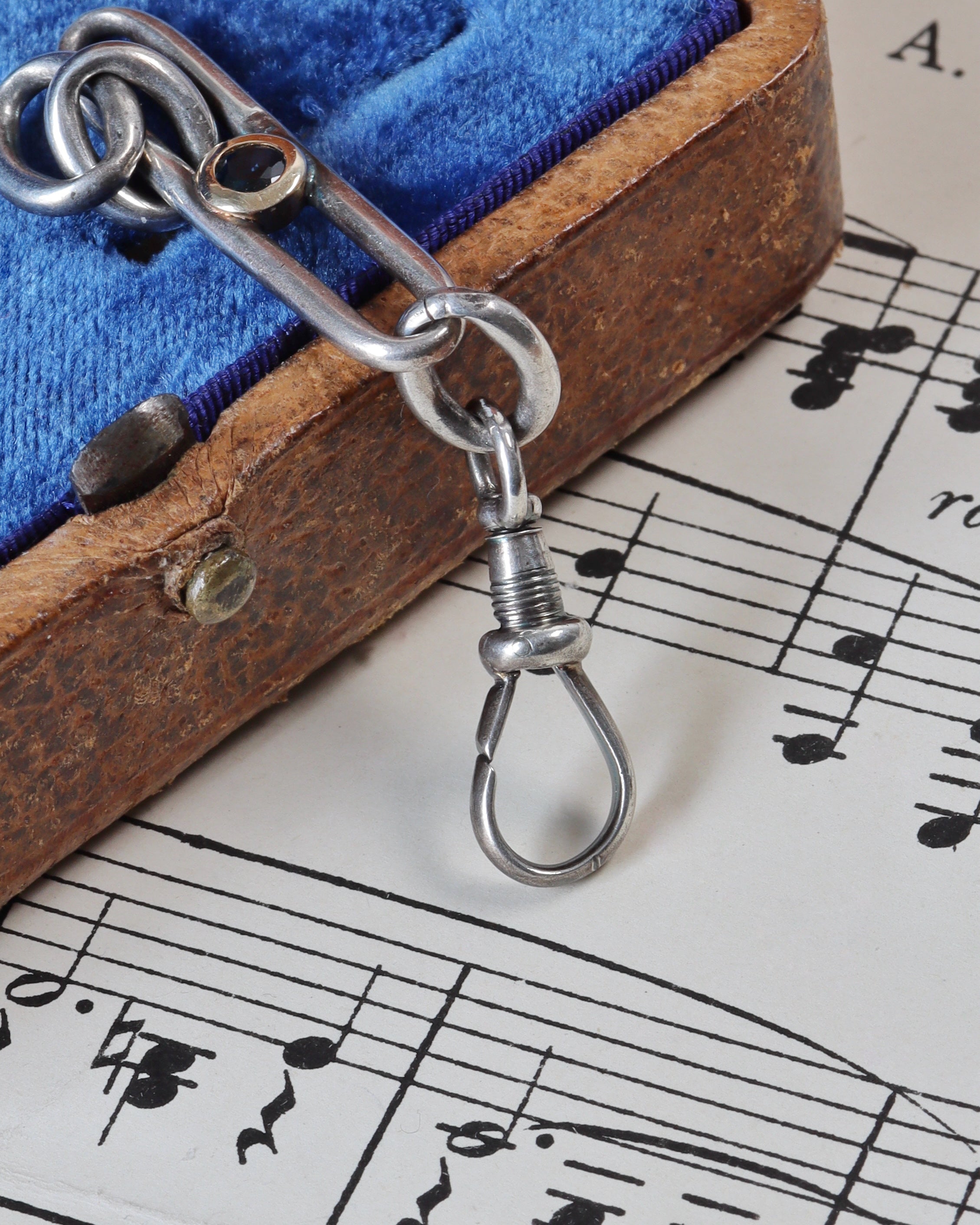 Antique Trombone Link Extender with Faceted Sapphire & Silver Swivel Dog Clip