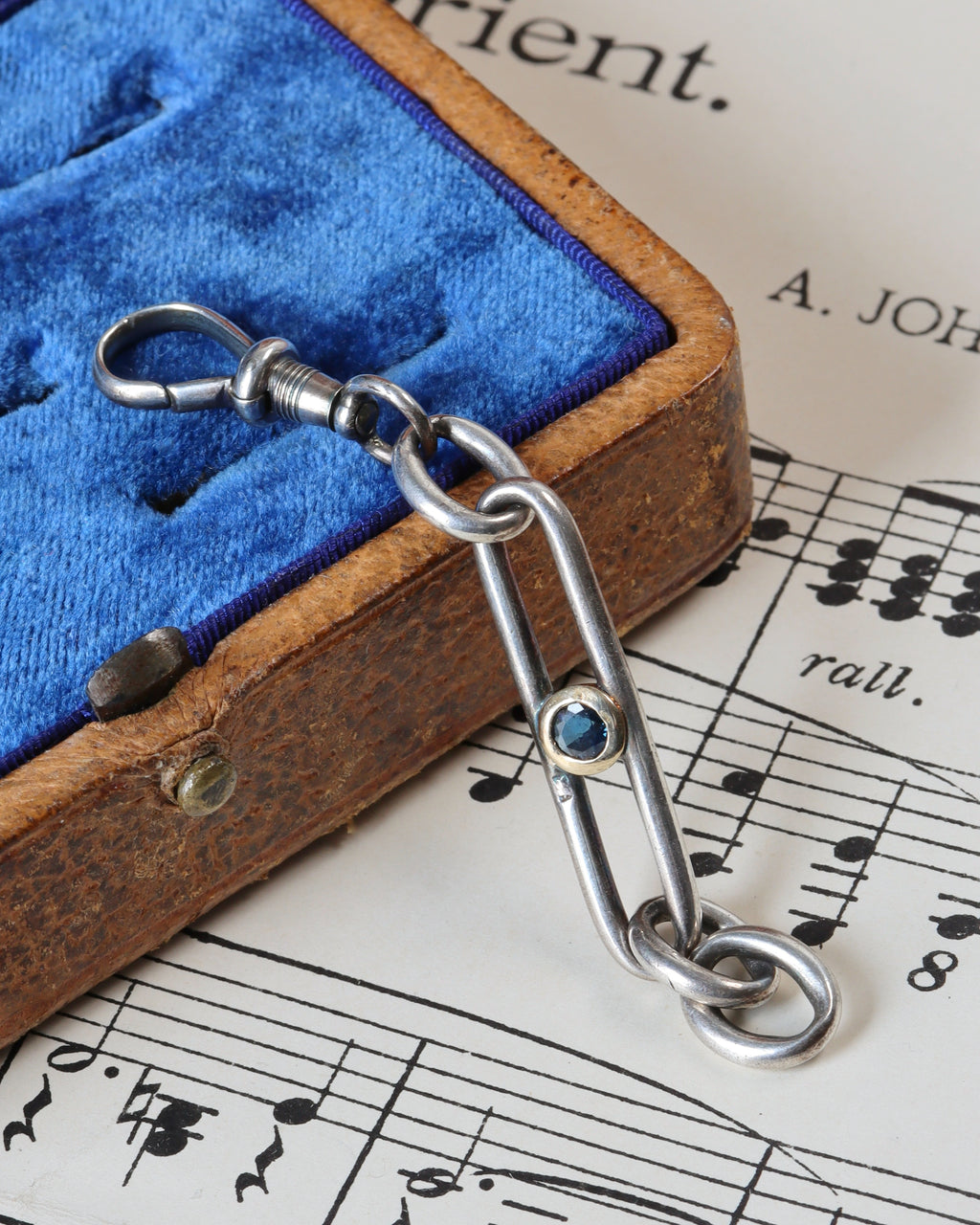 Antique Trombone Link Extender with Faceted Sapphire & Silver Swivel Dog Clip
