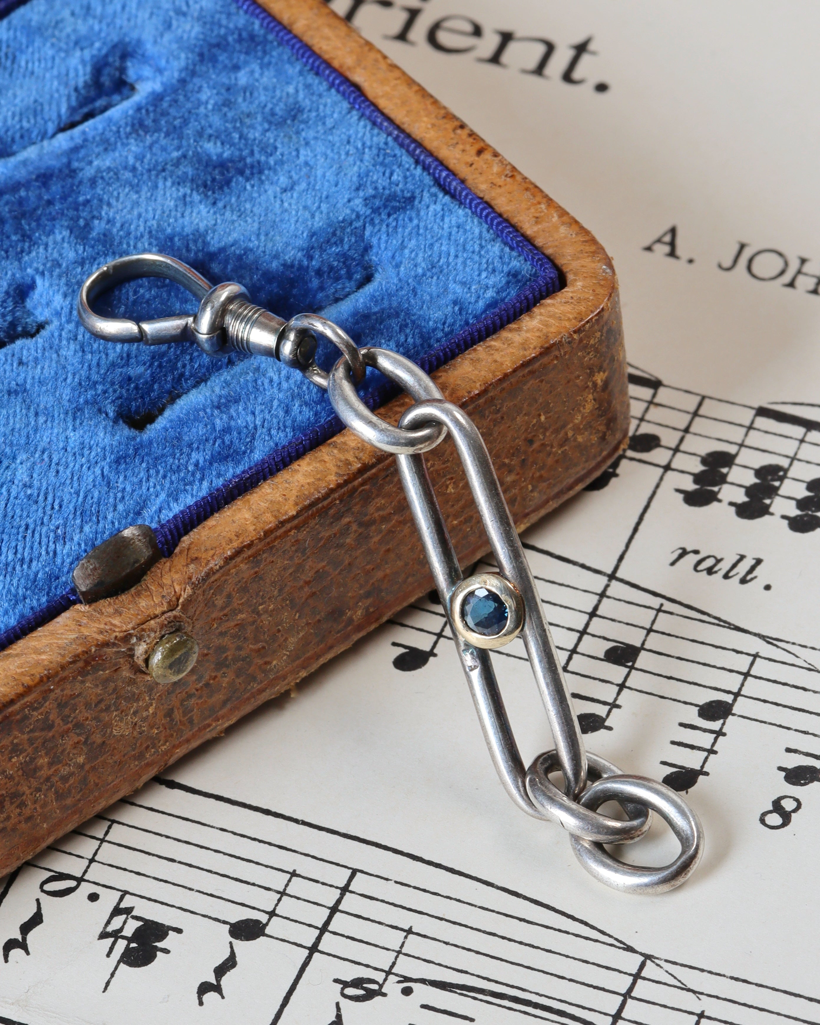 Antique Trombone Link Extender with Faceted Sapphire & Silver Swivel Dog Clip