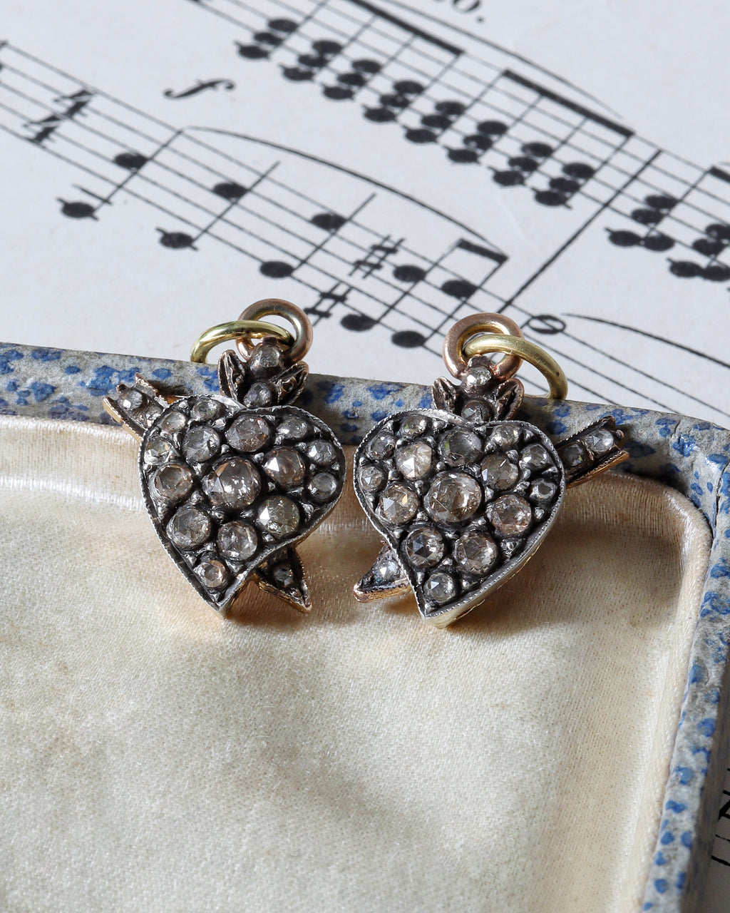 Two Victorian Silver Witches' Heart Charms with Rose Cut Diamonds