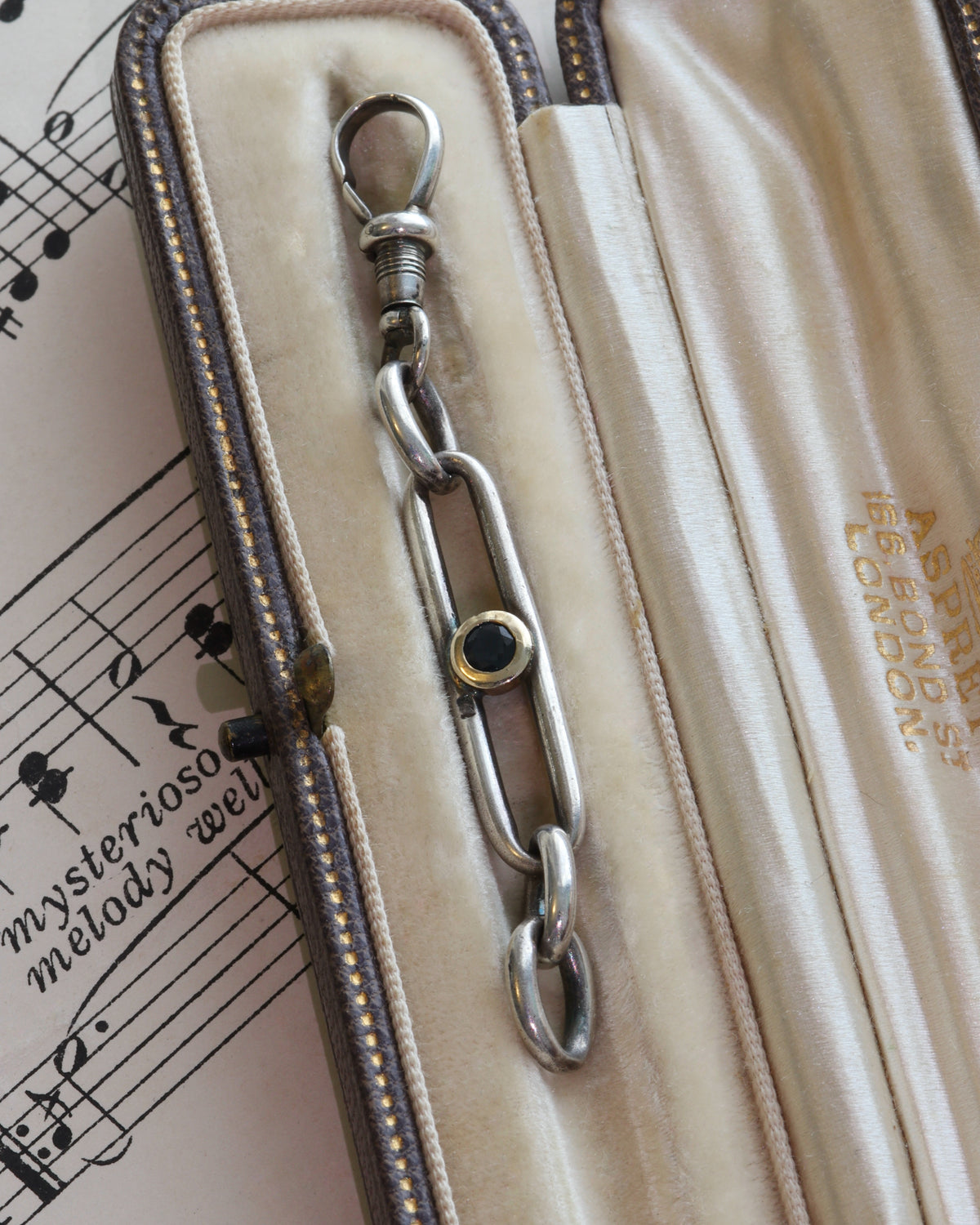 Antique Trombone Link Extender with Faceted Sapphire & Silver Swivel Dog Clip