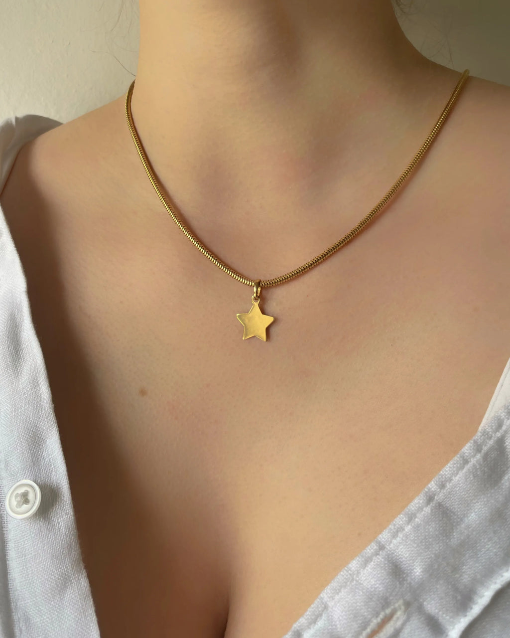 Two Vintage 18ct Gold Star Charms
