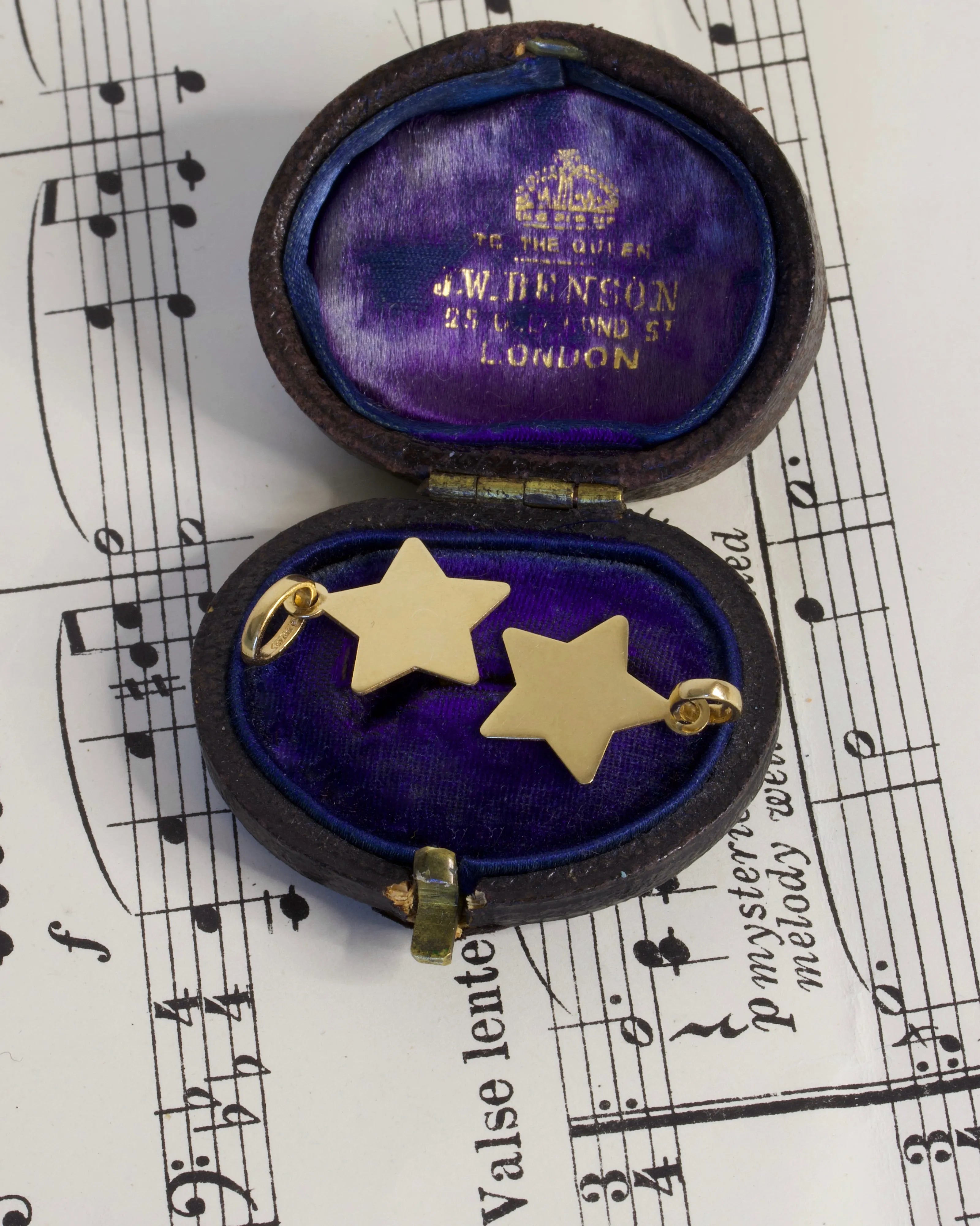 Two Vintage 18ct Gold Star Charms