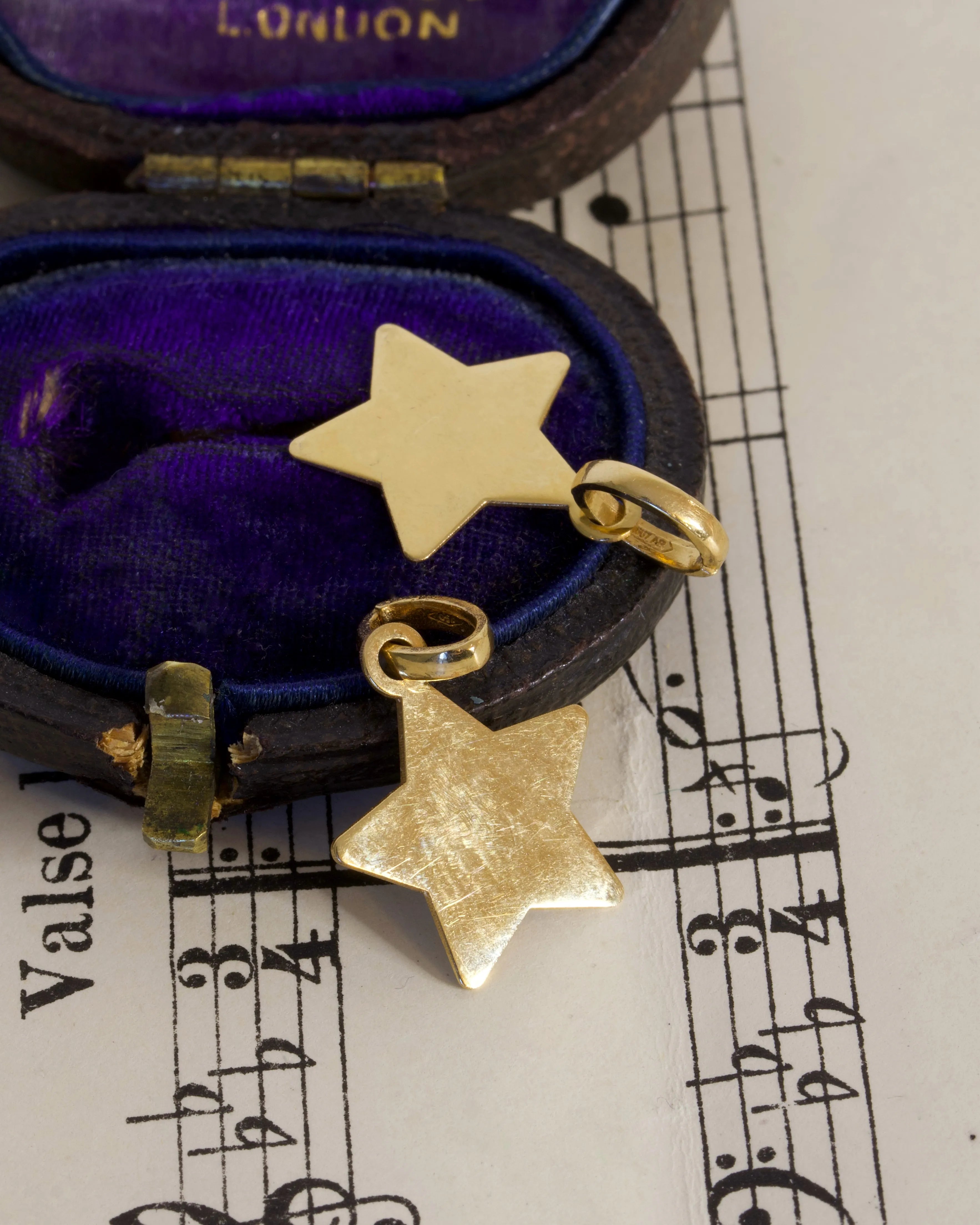 Two Vintage 18ct Gold Star Charms