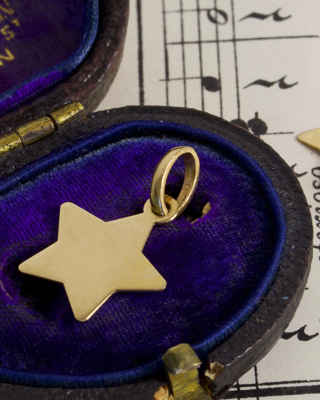 Two Vintage 18ct Gold Star Charms