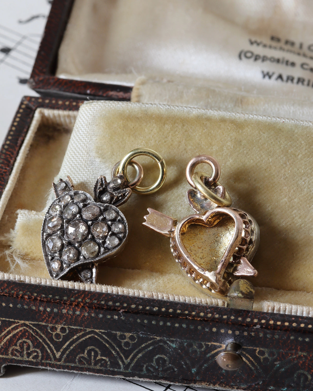 Two Victorian Silver Witches' Heart Charms with Rose Cut Diamonds
