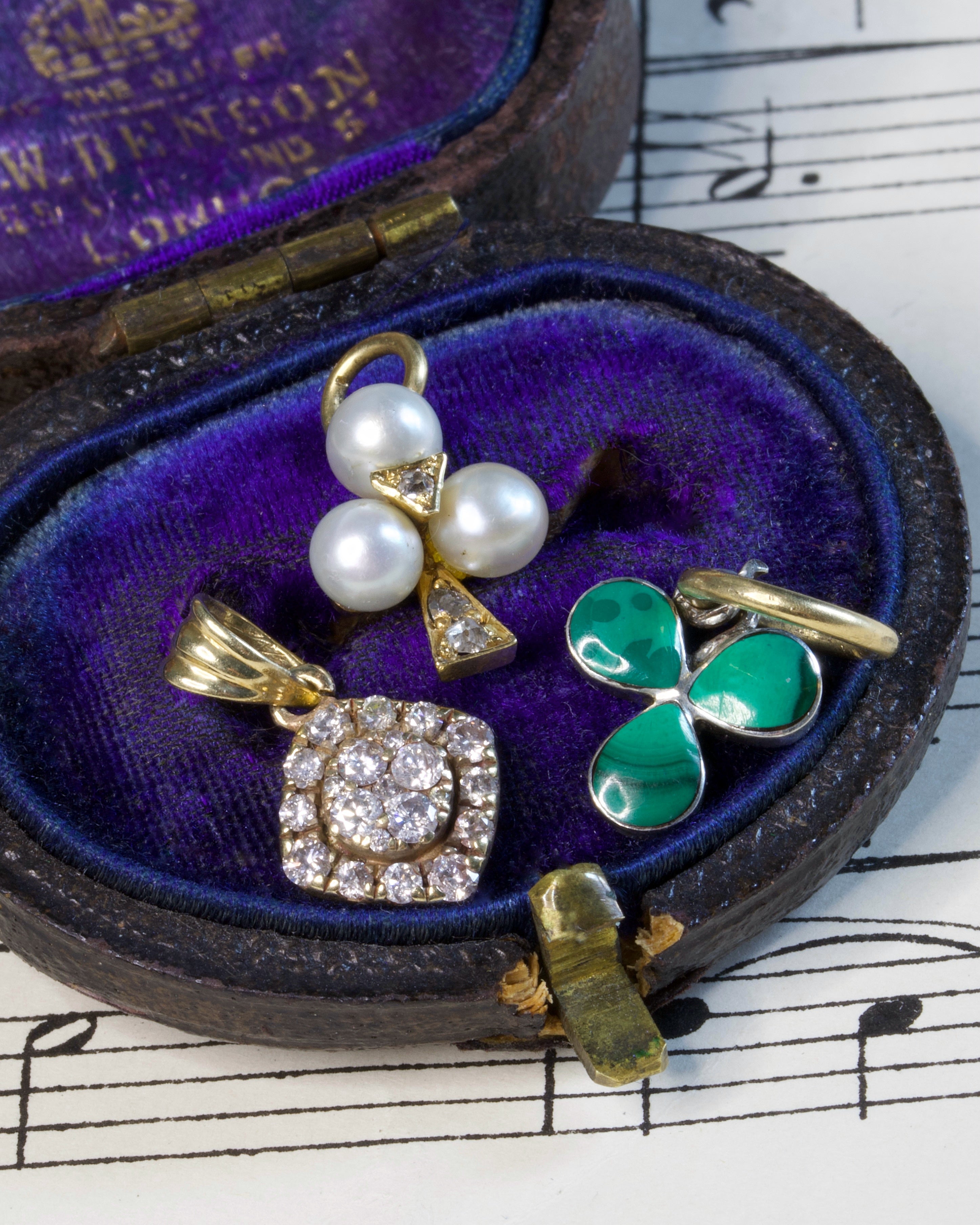 Two Victorian Silver & Malachite Lucky Clover Charms